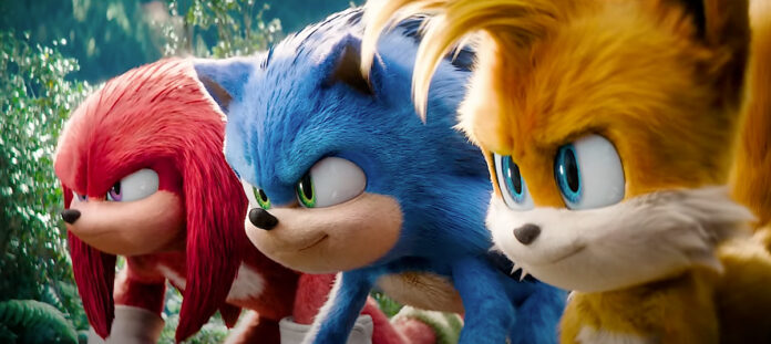 Knuckles, Sonic, and Tails (left to right) preparing to run at an enemy in Sonic the Hedgehog 3.